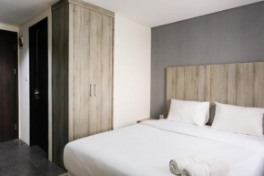 Minimalist Studio Room at Bintaro Icon Apartment By Travelio